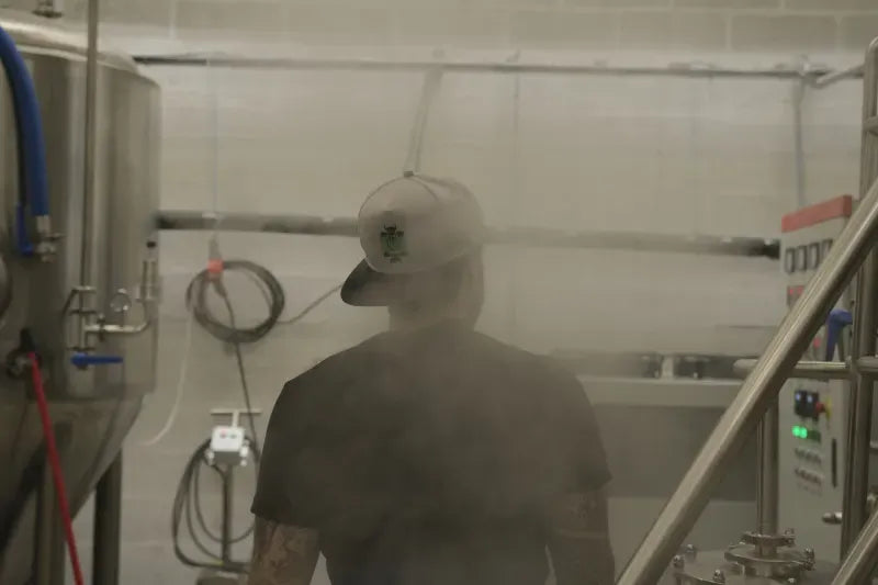 Romain dans la vapeur du brassage